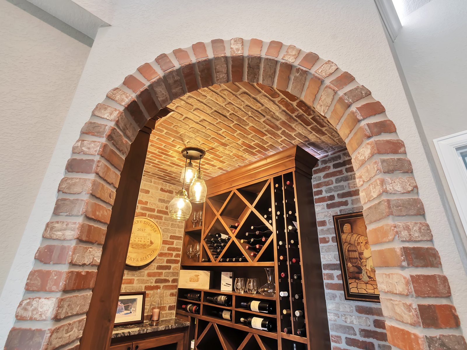 Brick-arched wine cellar in a finished basement