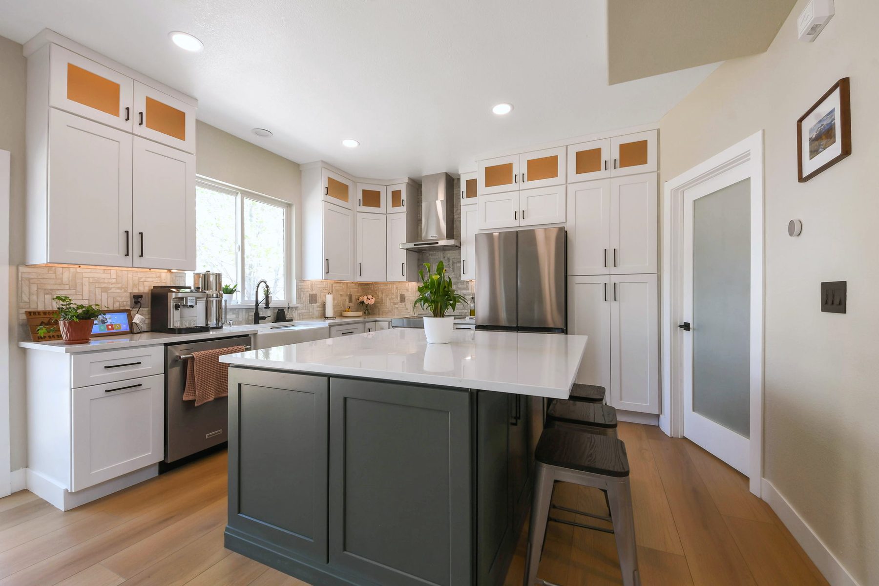 Remodeled kitchen with custom shaker cabinetry and island